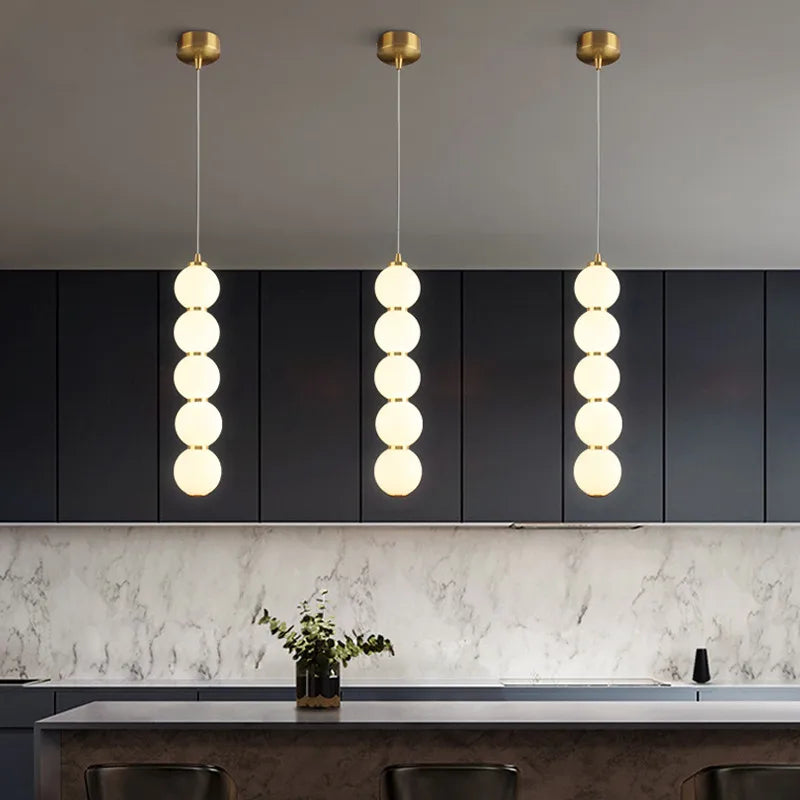 Suspension design à led boule verre or brillant