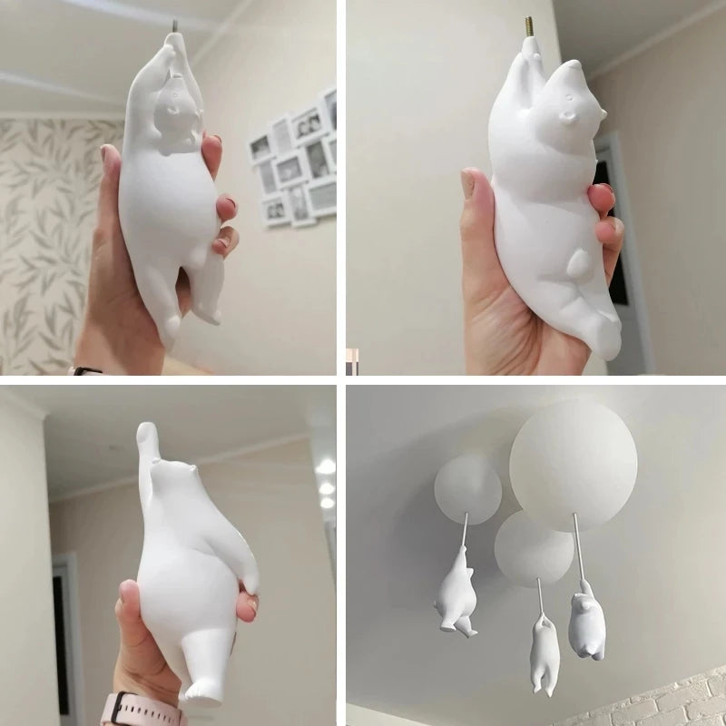 Suspension avec boule en verre et ours suspendu