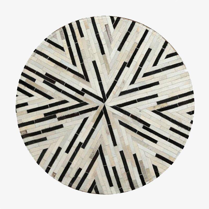 Moderna alfombra redonda con formas geométricas en blanco y negro Skin