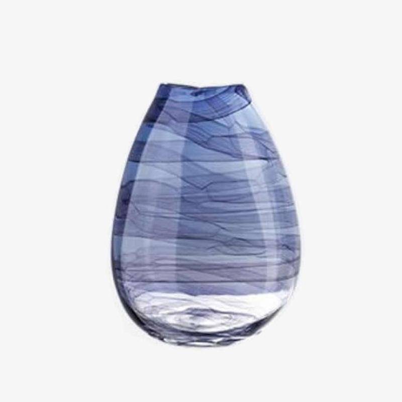 Design vase in purple glass, abstract style