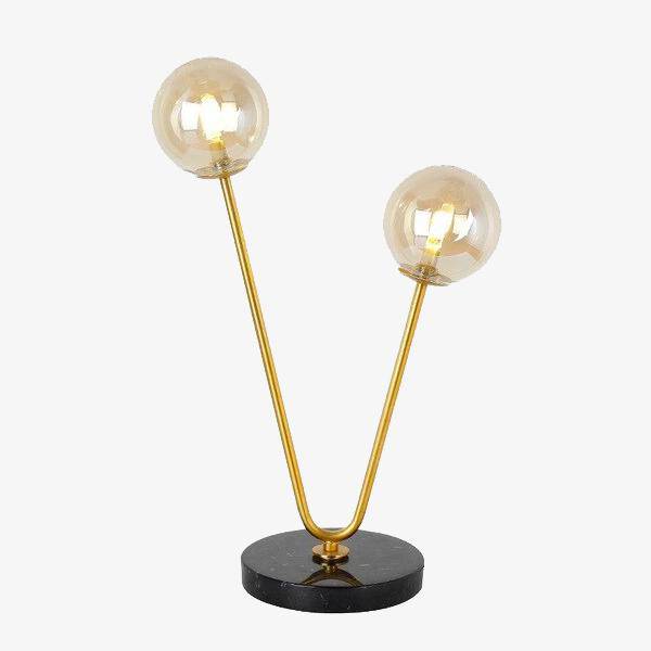 Lámpara de cabecera design con dos ramas doradas y bolas de cristal