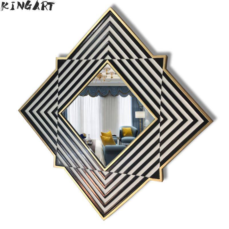 Wall mirror with diamond shape and black and white stripes in Frame wood