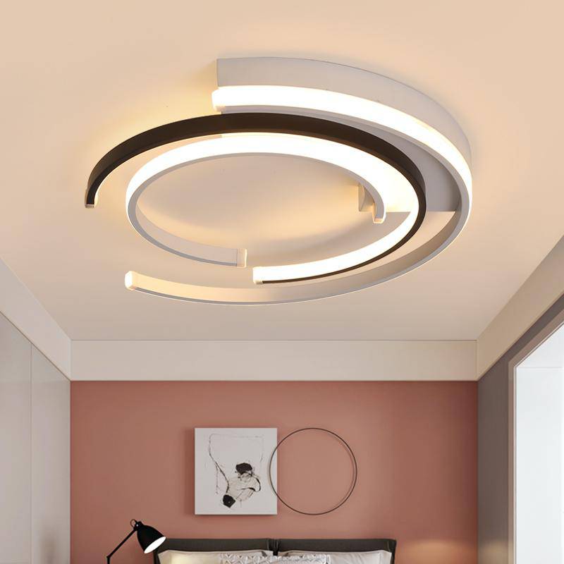 Modern LED ceiling light in the shape of an arc of circles