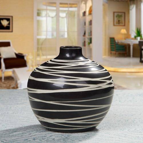 Design vase in black ceramic with zebra pattern