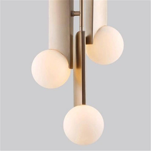 Lámpara de suspensión design LED dorado con bolas de latón