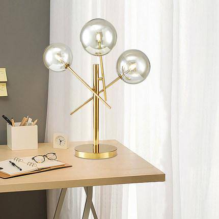 Lámpara de mesa design bolas de oro y cristal