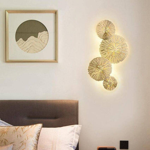 wall lamp LED design wall with several gold or copper discs in flower style