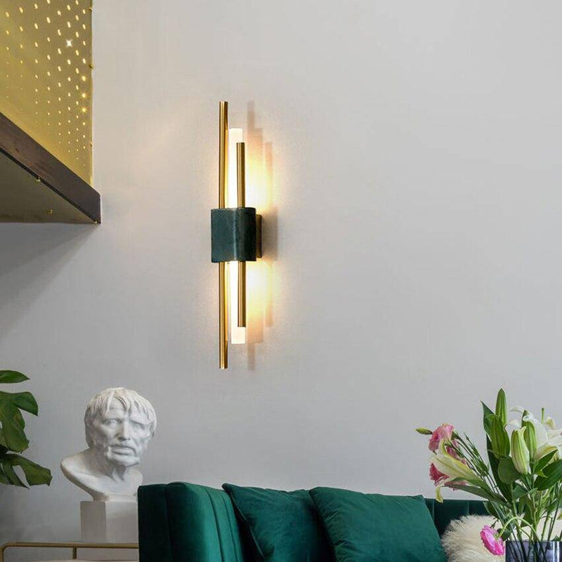 Lámpara de pared design LED en mármol con tubo dorado Sconce
