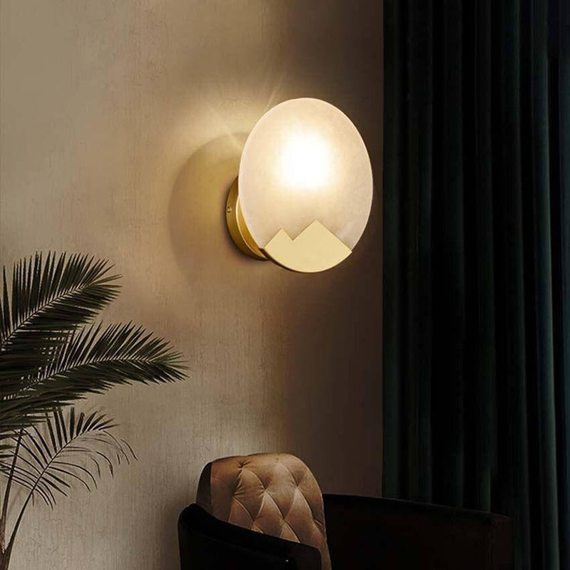 Applique murale design LED avec disque de marbre et métal doré