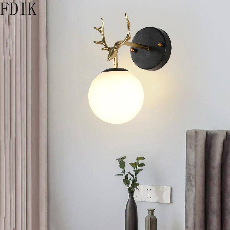 wall lamp golden deer horns and glass ball Antler