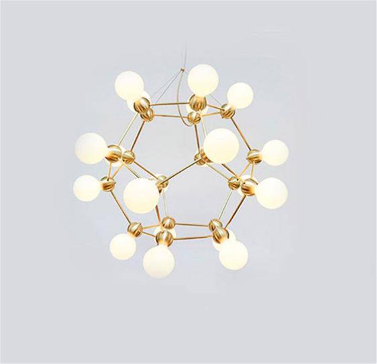 Geometric design chandelier with several golden arms and Molecule balls