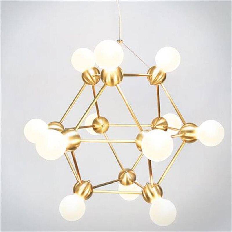 Geometric design chandelier with several golden arms and Molecule balls