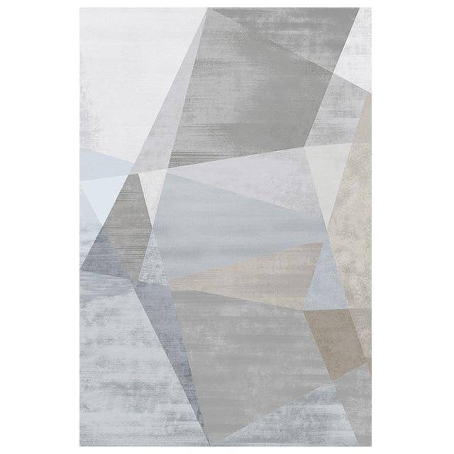 Rectangular design carpet with grey geometric shapes Area