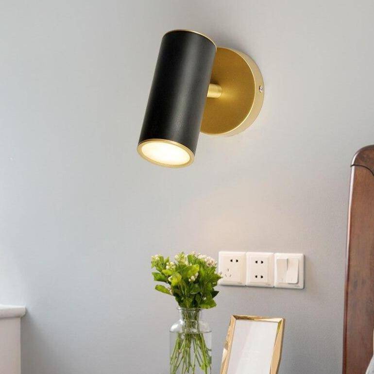 Applique murale LED avec spot cylindrique en métal doré