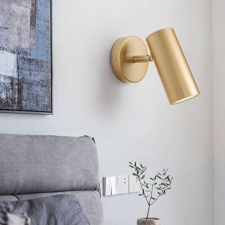 Applique murale LED avec spot cylindrique en métal doré