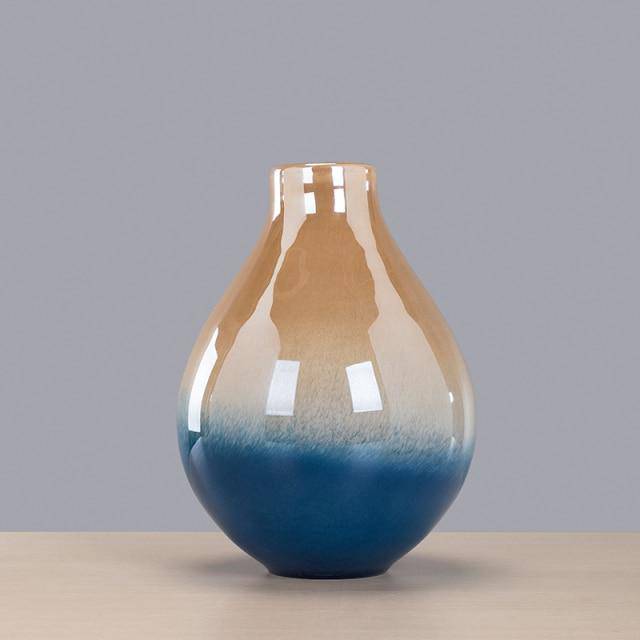 Vase design bleu et doré aux formes arrondies style Luxury