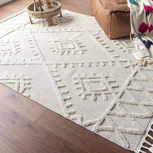White Berber rectangle carpet with raised patterns and fringes