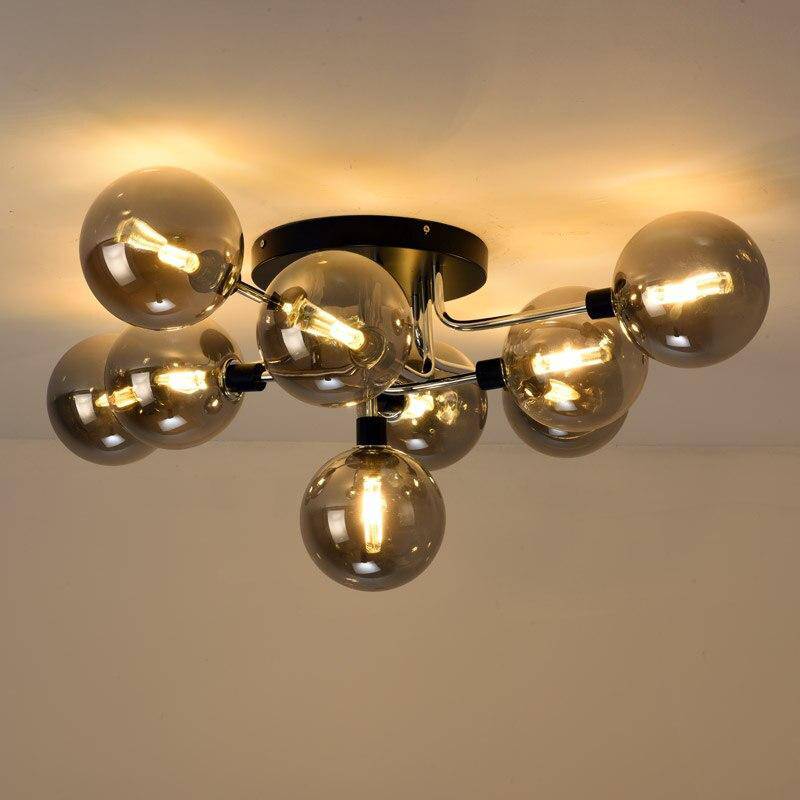 Lámpara de techo design con brazos LED y bolas de cristal