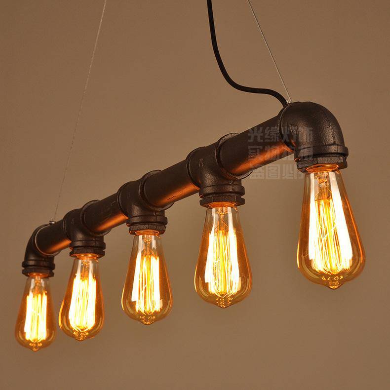 Rustic and industrial pendant light with several lamps