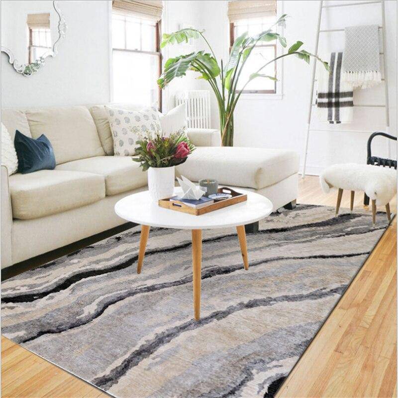 Rectangular carpet with grey wavy lines