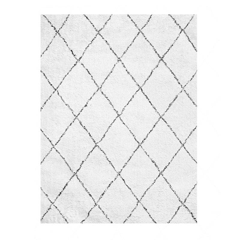 Tapis shaggy rectangle blanc à quadrillage noirs