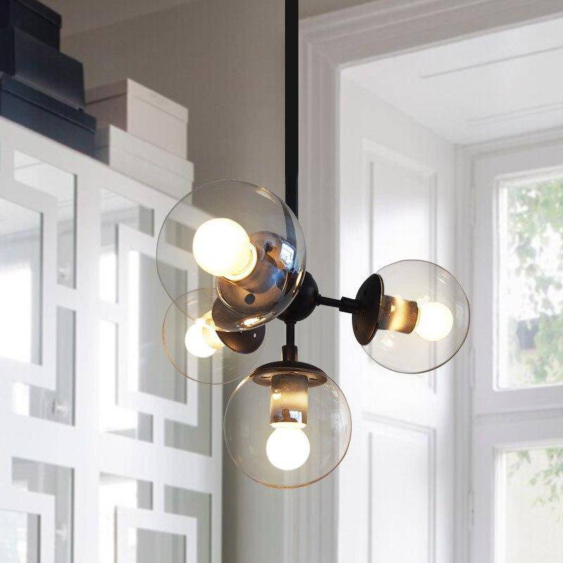 Design pendant light with lamp in glass ball