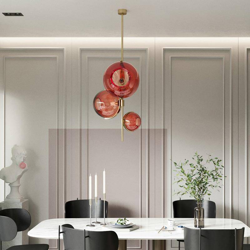 pendant light LED design with gold stem and three red glass balls