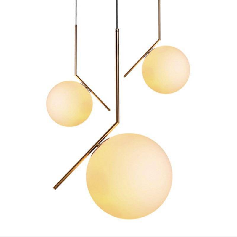 Lámpara de suspensión design con barra de oro y bola de cristal