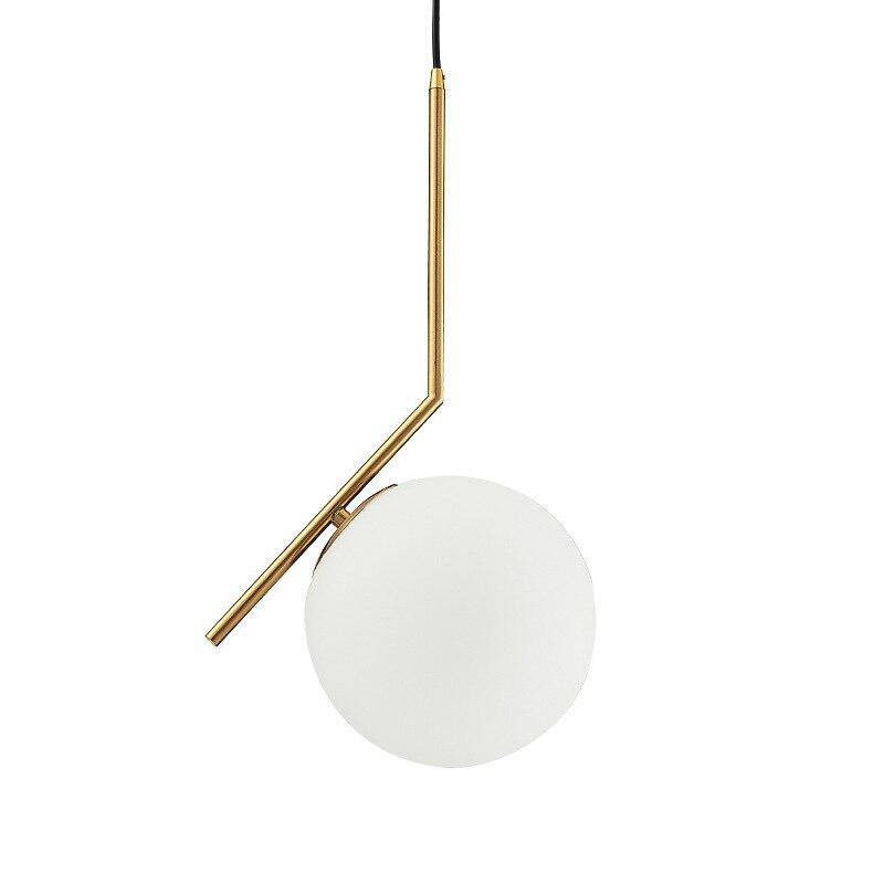pendant light design with gold bar and glass ball