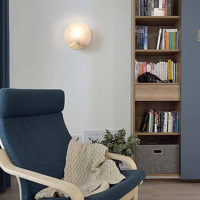Applique murale design LED avec disque de marbre et métal doré