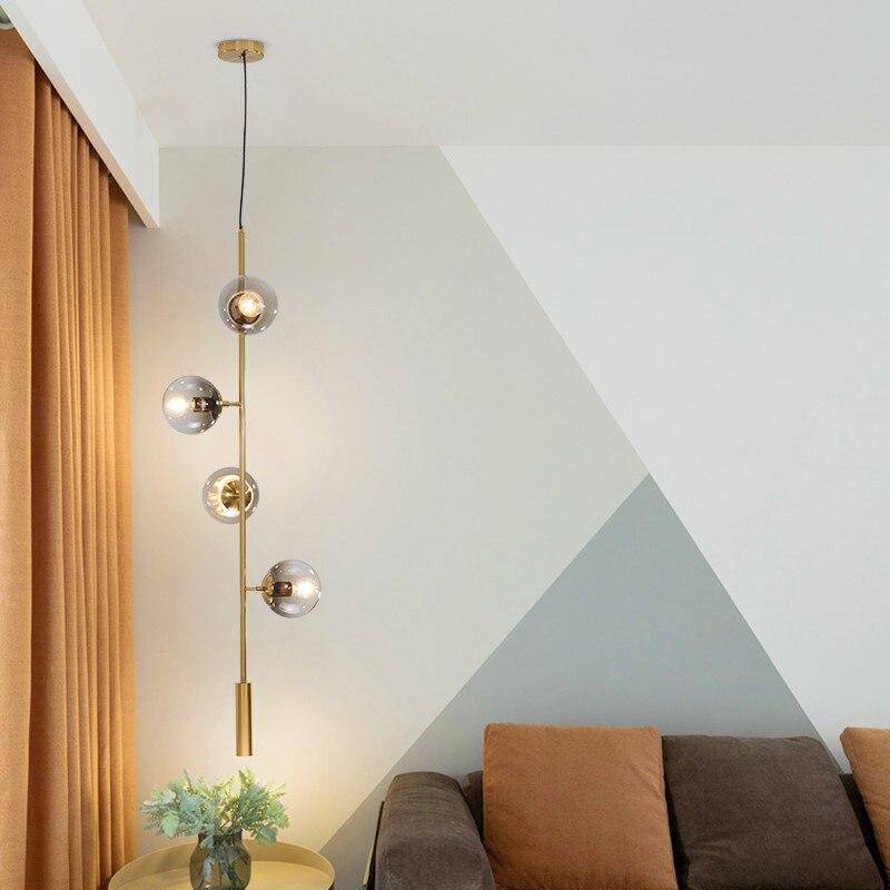 Lustre design LED en métal avec plusieurs boules en verre rétro