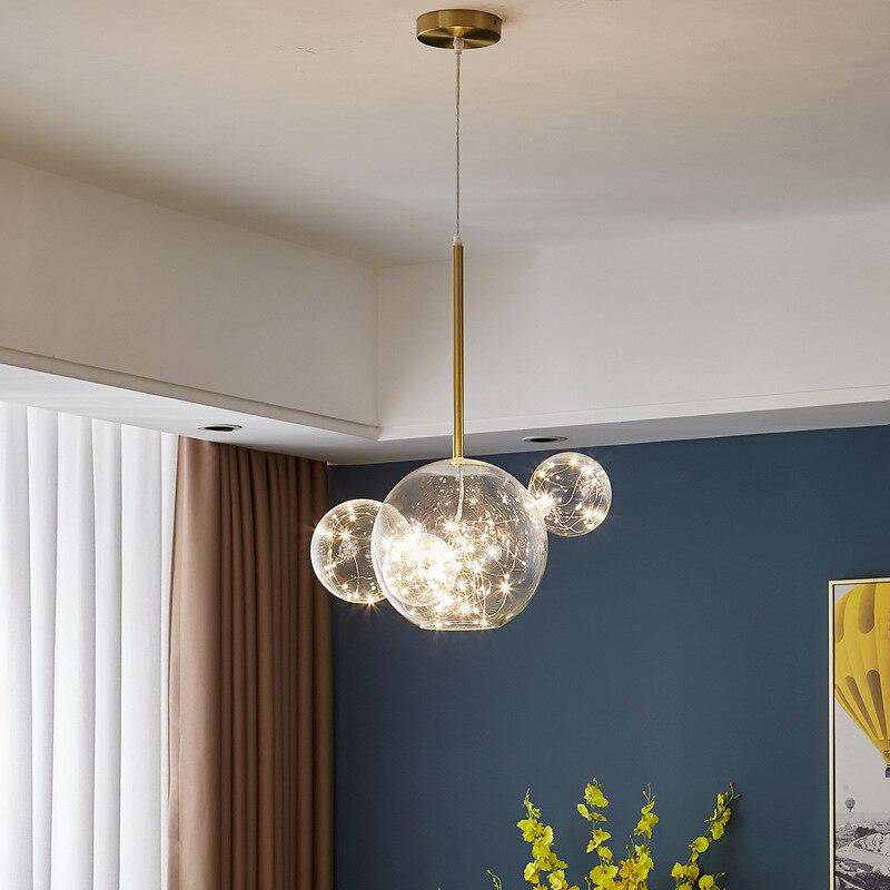 Lámpara de suspensión design con LEDs dorados y bolas de cristal de lujo