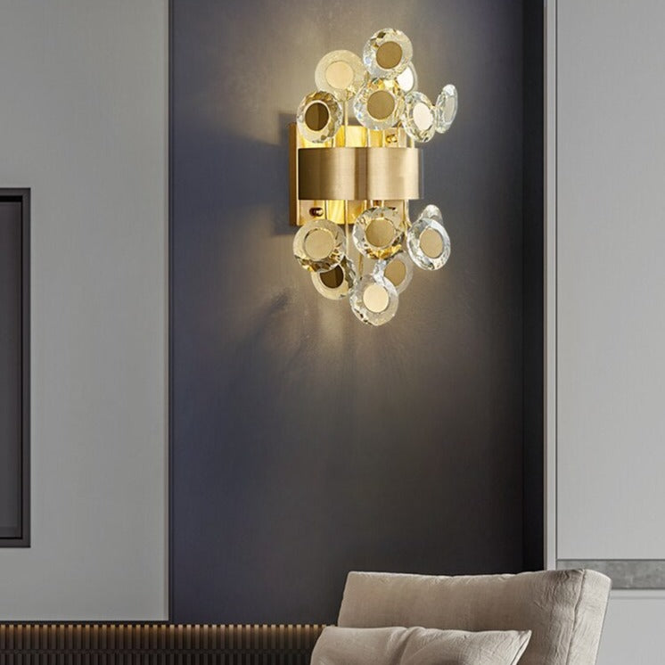 Moderna lámpara de pared LED con detalles redondos y dorados Uma