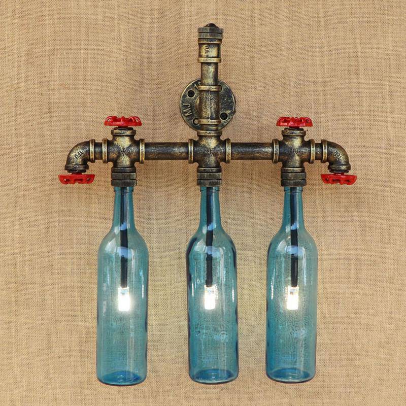wall lamp wall-mounted with piping and coloured glass bottles