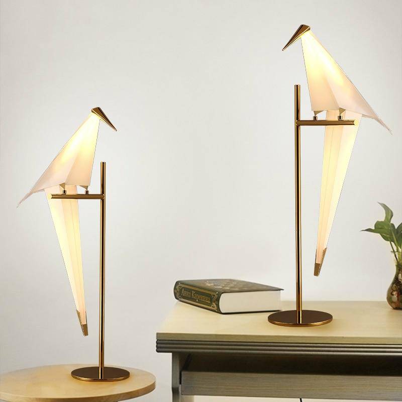 Table lamp in the shape of a bird on a golden branch