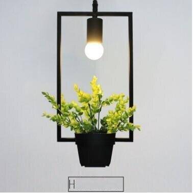 Shape pendant lamp with green plants Trazos