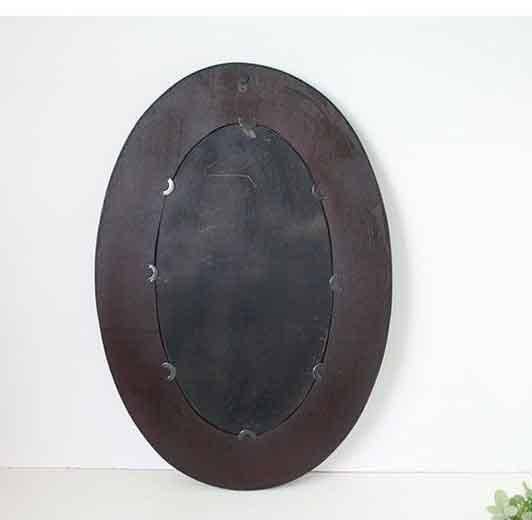 Long oval decorative wall mirror in dark brown bamboo