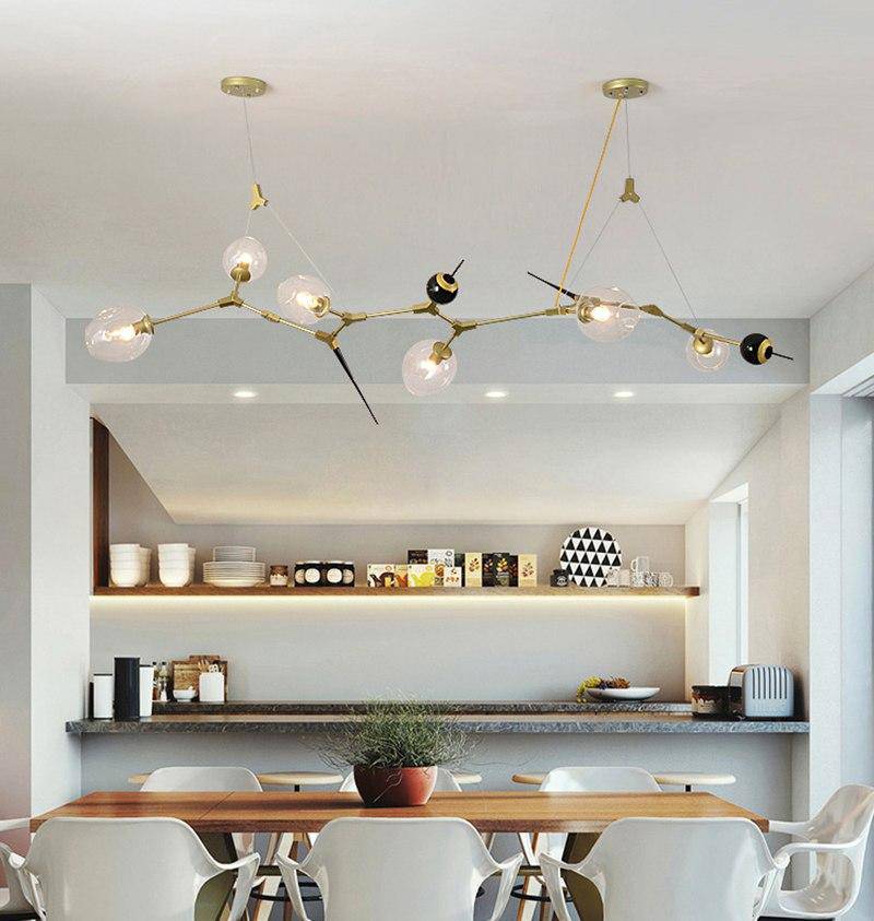Lustre design à LED moderne doré et noir avec boules en verre et pics