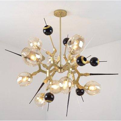 Modern gold and black LED design chandelier with glass balls and spikes