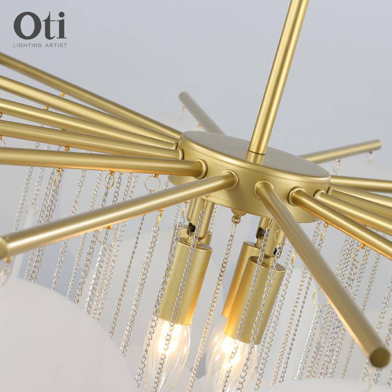 Lustre design avec branches dorées et boules en verre Vertigo