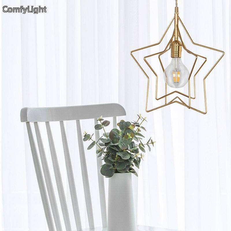 Pendant light in the shape of a golden star Dining