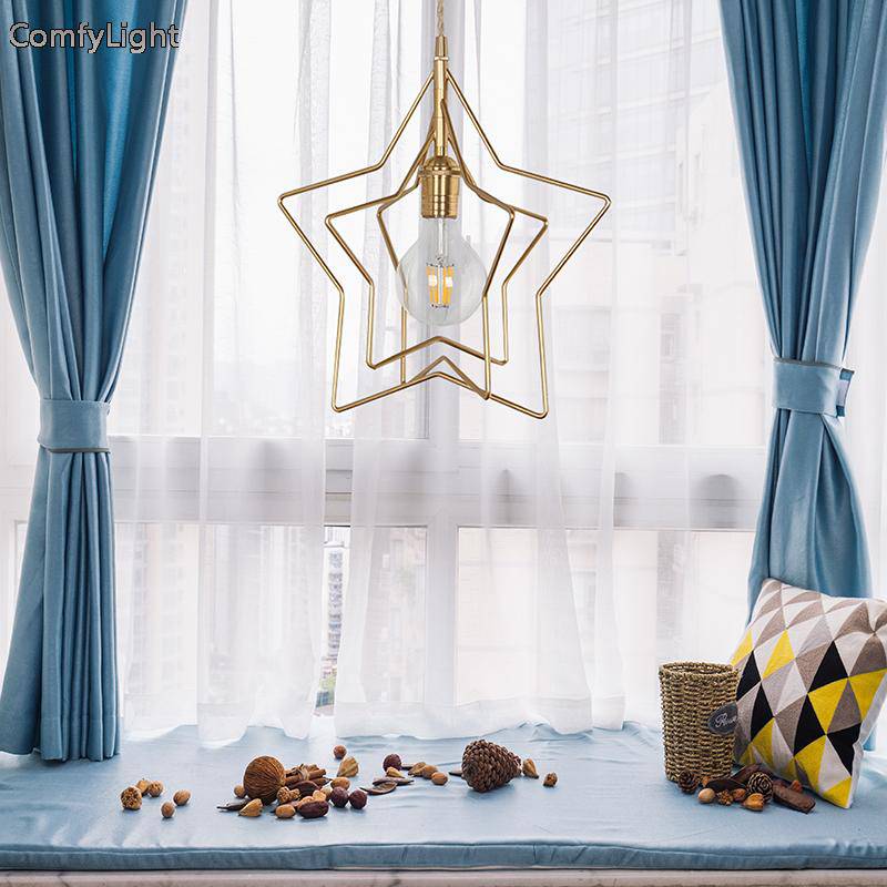 Pendant light in the shape of a golden star Dining