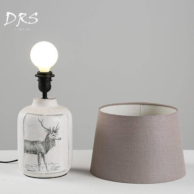 Bedside lamp with lampshade fabric and deer design