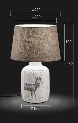 Bedside lamp with lampshade fabric and deer design