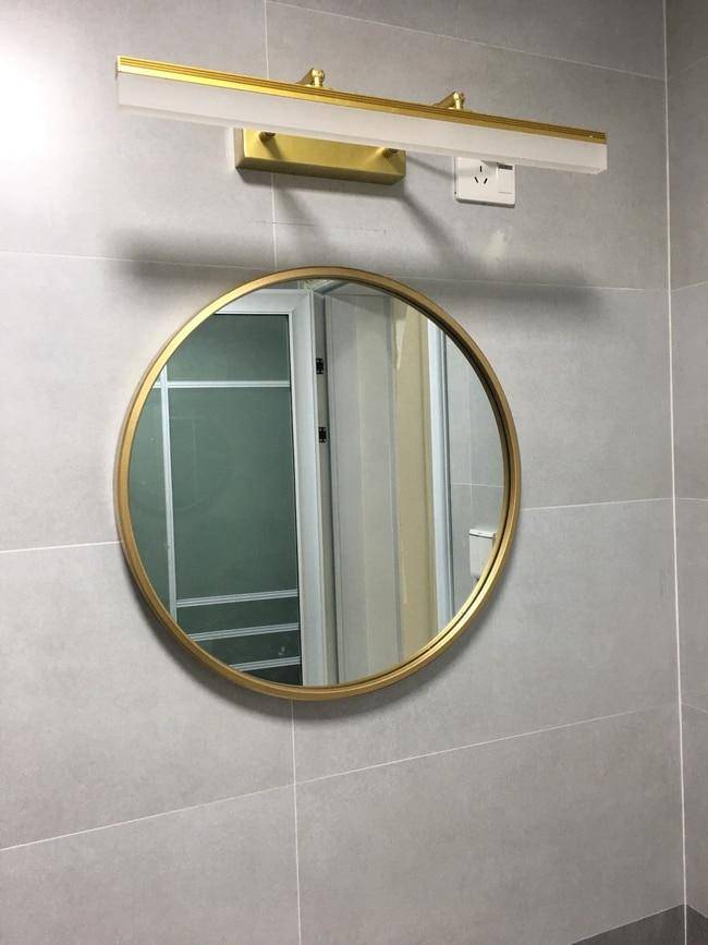 European round gold wall mirror