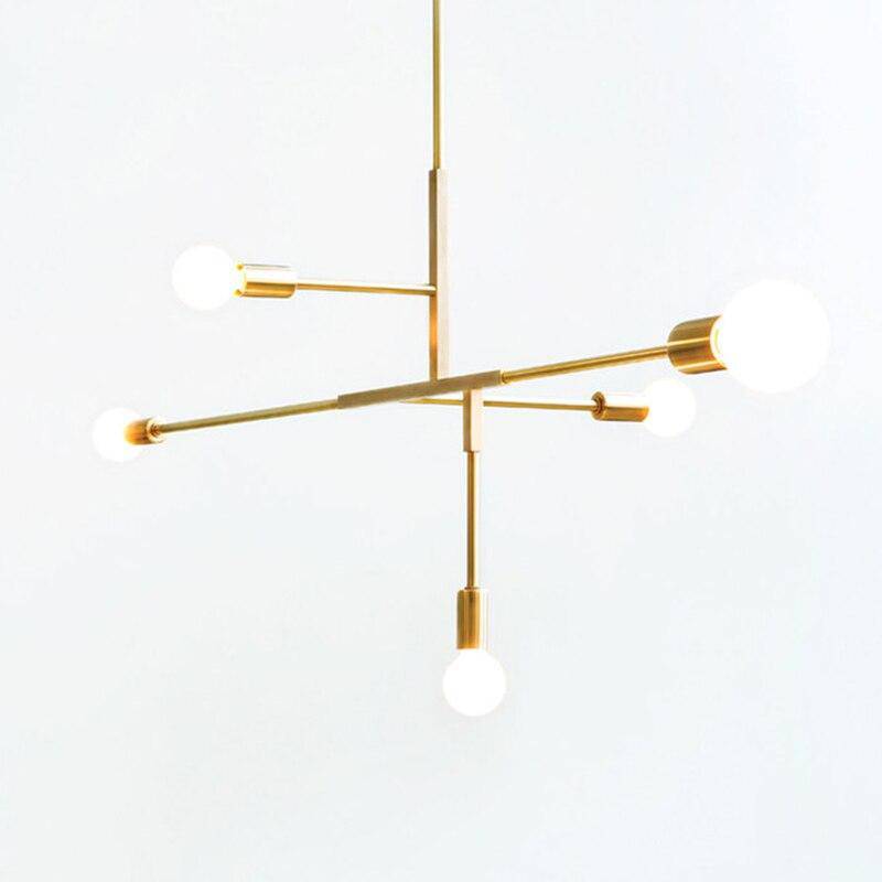 Design chandelier with golden arm Creative