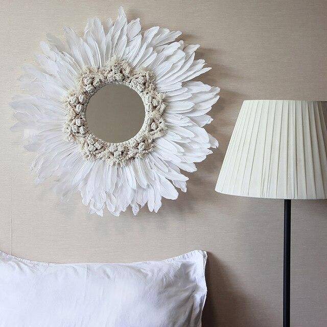 Round decorative wall mirror with white feathers Modern