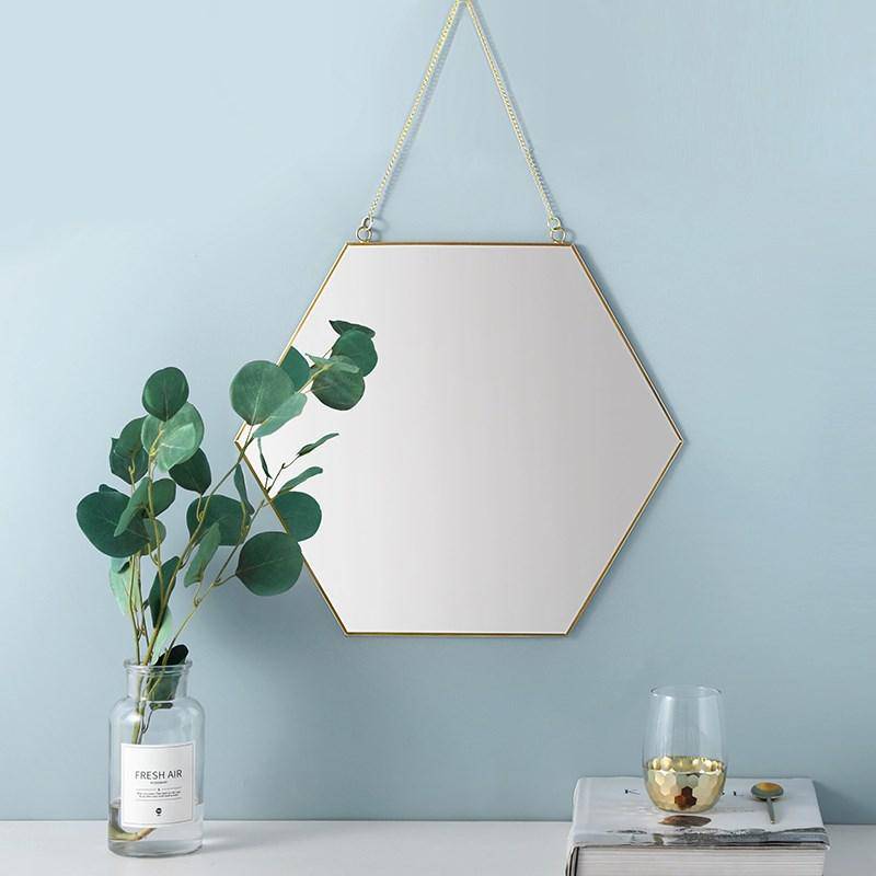 Decorative hexagonal wall mirror with wooden border Geometric