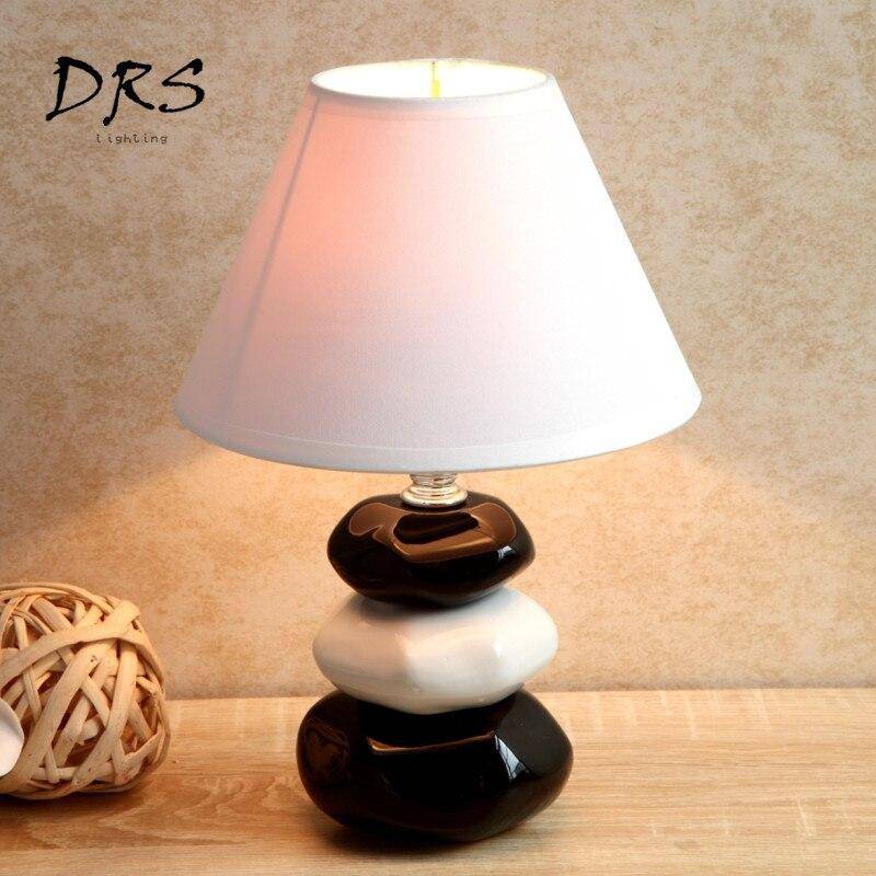 Black and white fax pebble bedside lamp with lampshade