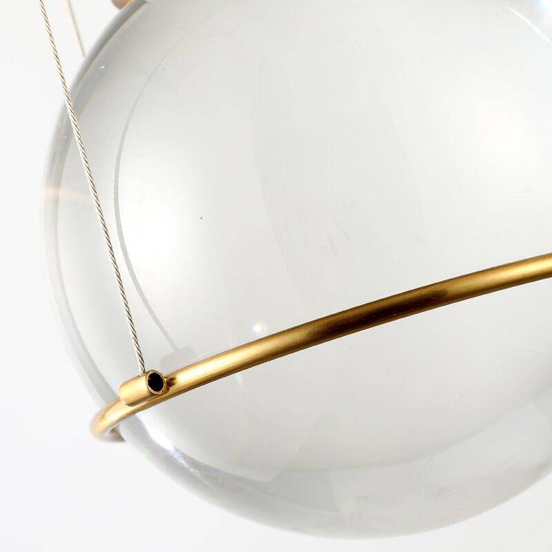 Lámpara de suspensión design LED en metal dorado con pantalla de cristal de lujo